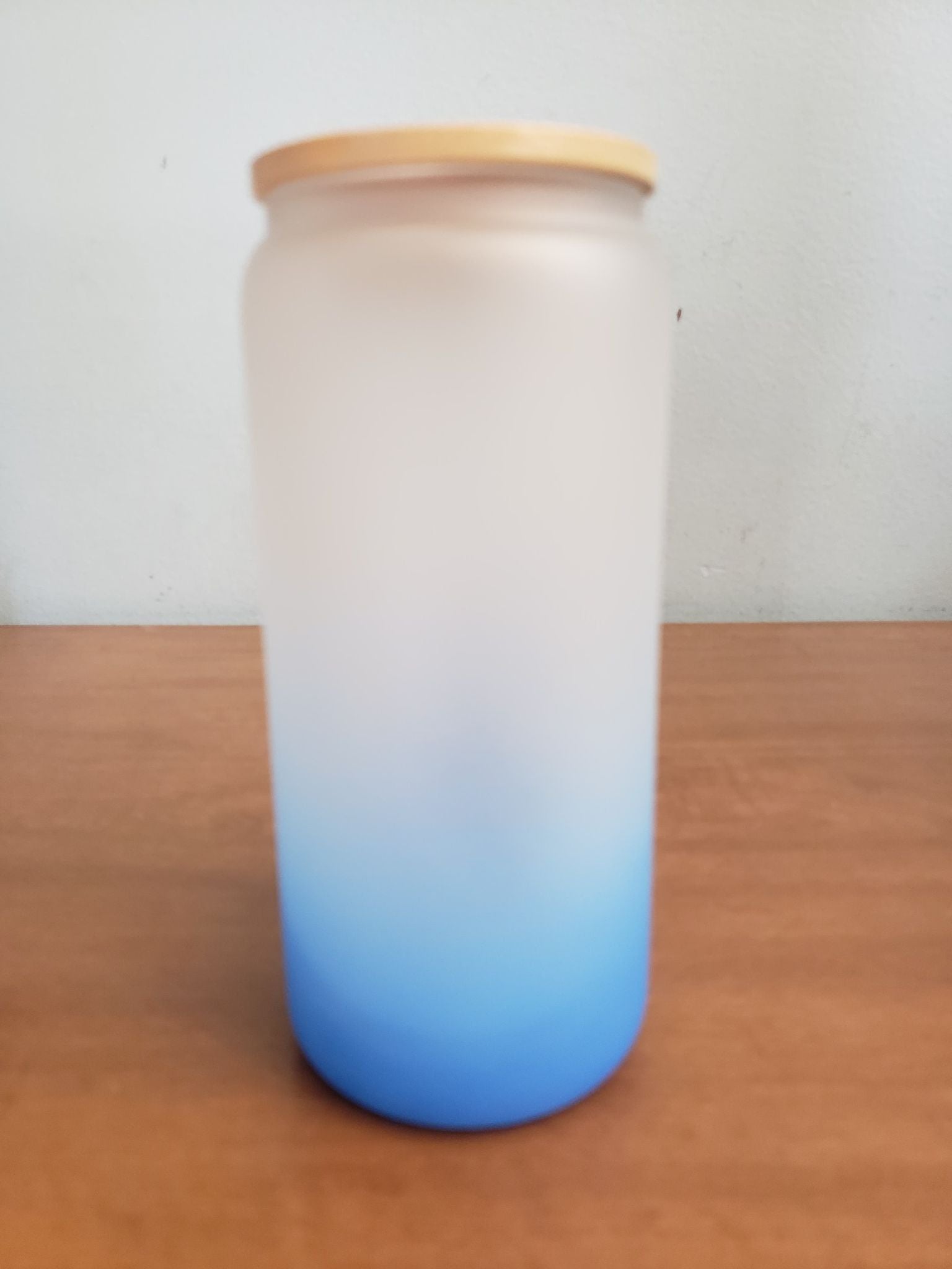 Blue Frosted glass 20oz cups with bambo lid and plastic straw