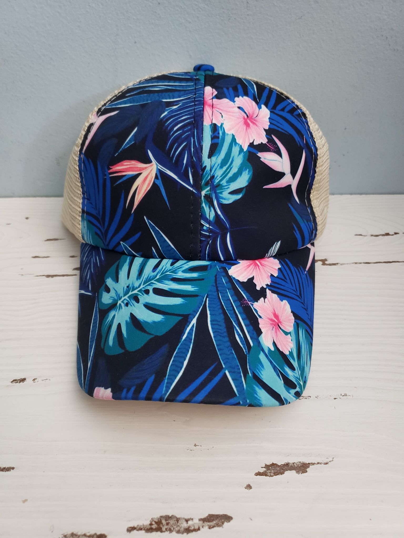 Blue floral criss cross ponytail hat