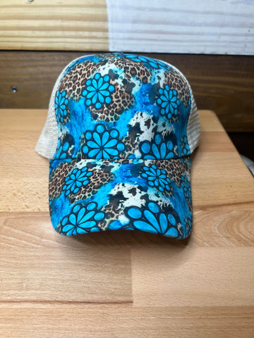 Blue multi print criss cross ponytail hat